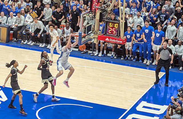 Duke_and_Wake_Forest_basketball_game,_2025-03-03_Wake_Forest_Cooper_Flagg_dunking_C